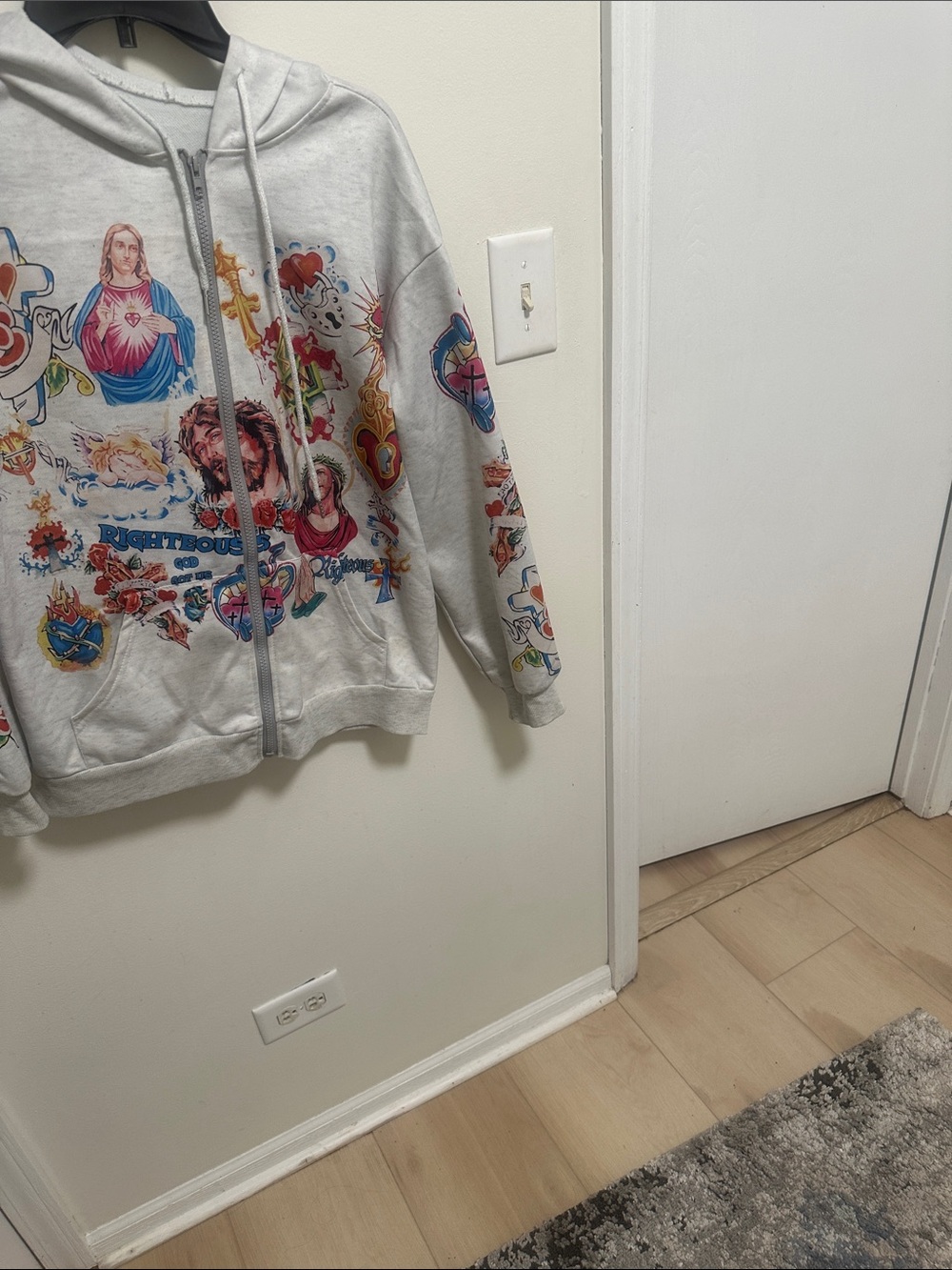 Graphic White Zip Hoodie with Colorful Religious Motif